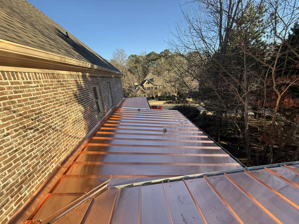 Standing seam metal roof installation on a Tennessee home by a licensed roofing contractor